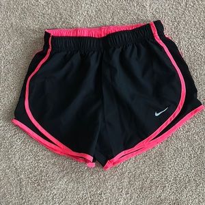 EUC Nike Black Dri-fit Shorts trimmed in neon orangish color Size M